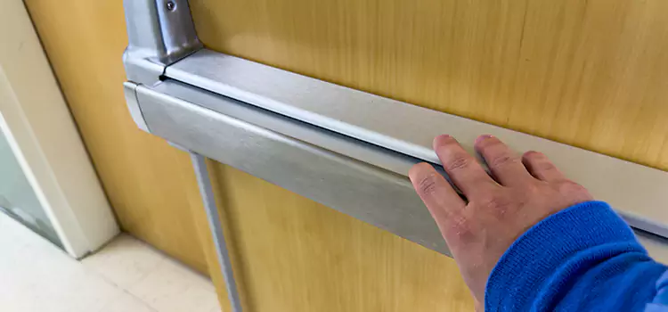 Installing a Push Bar on a Door Minot